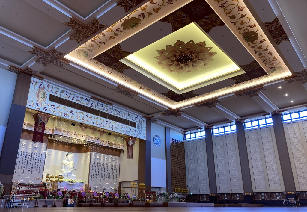 Prayer room in Bukkosan Hosuiji Temple with idols and lucky symbols wherever you look