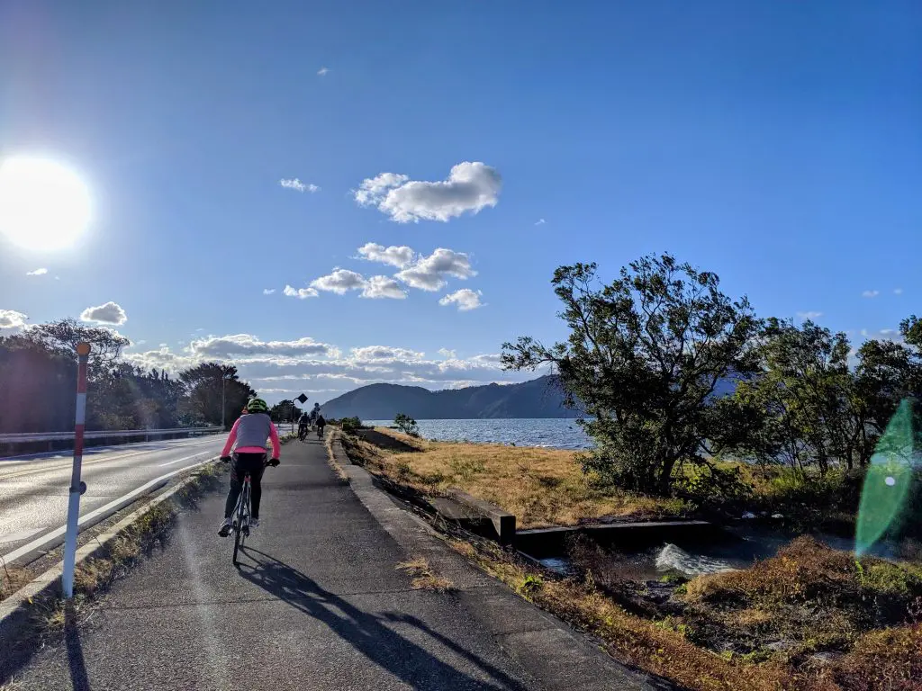 Cycling along the Lake Biwa Ichi Cycling Route.